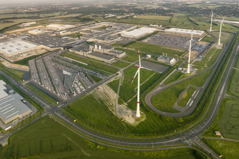 Four modern wind turbines installed at BMW’s electric car manufacturing plant in Leipzig (2013) as seen from above